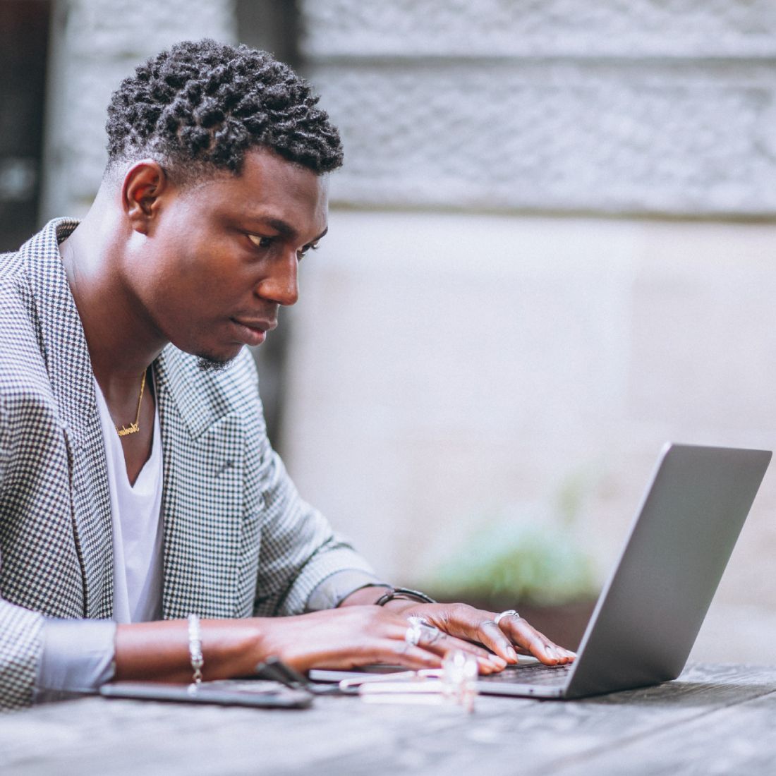 A customer completing an online request at home